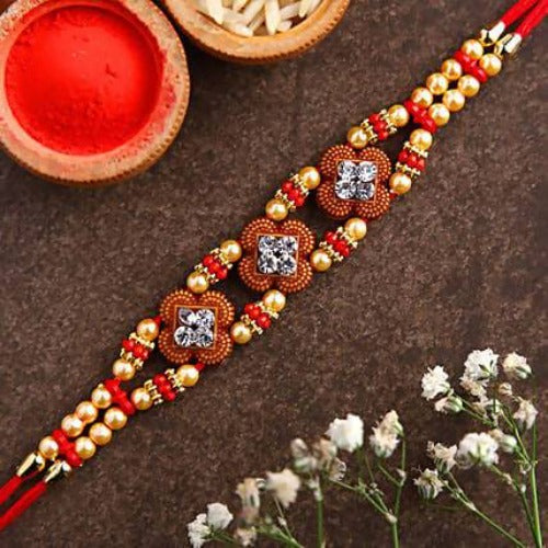 Ethnic American Diamond Rakhi and Kaju Katli Box Combo
